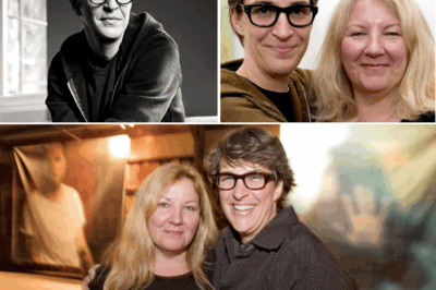 RACHEL MADDOW SHARES HEARTBREAKING CANCER DIAGNOSIS AFTER SUSAN MIKULA NOTICES A MOLE—THE SURPRISING MOMENT THAT CHANGED EVERYTHING! Rachel Maddow recently opened up to her audience about a life-changing moment at a minor league baseball game with her partner of 22 years, Susan Mikula. While watching the game, Mikula noticed a mole on Maddow’s neck that had changed, leading to a trip to the dermatologist. What followed was a shocking diagnosis—Maddow had cancer. In this raw and emotional revelation, Maddow shares the unexpected turn her life took, and how it’s reshaping her perspective. The full story of this difficult journey is unfolding—watch now 👇👇👇