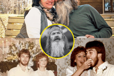 PHIL ROBERTSON’S DYING GRIP ON KAY’S HAND UNLEASHES GUT-WRENCHING SECRET: DUCK DYNASTY LEGEND’S FINAL ACT EXPOSES A BRUTAL BETRAYAL—WHAT DID SHE HIDE?  Prepare for the Duck Dynasty bombshell that’s shattering hearts across America! On May 29, 2025, the world was left reeling as Kay Robertson held her husband Phil’s hand during his final moments—a raw, sacred ritual that defined their 60-year marriage of redemption and resilience. Phil, who passed at 79 after a secret battle with Alzheimer’s, had squeezed Kay’s hand every night, a vow of honor and love despite a lifetime of scandals. His emotional farewell, shared in a viral 2024 post, declared, “She fought for me when the world said run.”  But just days after their last photo together on May 27, 2025, a chilling new revelation has surfaced: Kay allegedly concealed a $2 million family feud over Phil’s estate. Leaked fragments of his will suggest she cut one of their sons out, allegedly to “protect the legacy” of Duck Dynasty. Social media is ablaze with fans sobbing over their heartwarming love story—while others are enraged. Was Kay’s final act of holding Phil’s hand a saintly farewell, or a sinister plot to seize power?