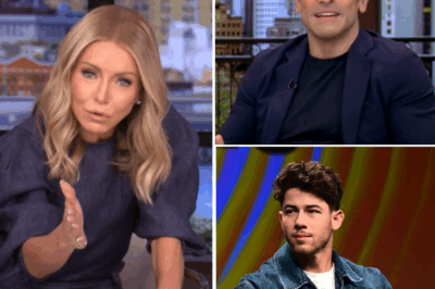 KELLY RIPA’S SHOCKING JAB AT MARK CONSUELOS LEAVES VIEWERS IN STUNNED SILENCE: “WILL HE REALLY BE CHECKING ON NICK JONAS’ DAUGHTER WITH A CANE IN A DECADE?” What started as a lighthearted comment quickly took a serious turn when Kelly Ripa made a pointed remark about her husband, Mark Consuelos. Questioning his role in the future of Nick Jonas’ daughter, Kelly’s words hit harder than expected: “Will he really be checking on her with a cane in a decade?” The tension in the studio was palpable as the comment seemed to reveal deeper issues between the couple. Is this just a throwaway line, or is there more to the dynamics of their relationship than meets the eye? The full story behind this unexpected exchange is now unfolding. 👇👇👇