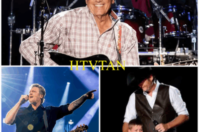 THE ARENA FELL SILENT: Blake Shelton HANDS THE MIC TO GEORGE STRAIT’S GRANDSON—A SHOCKING MOMENT THAT LEFT FANS IN AWE!  In a heart-stopping moment that no one saw coming, Blake Shelton bent down on stage and whispered to 8-year-old Harvey, George Strait’s grandson, “It’s your turn.” With sneakers too big and nerves running high, Harvey stepped into the spotlight to sing “God and Country Music.” His voice started shaky, but with every note, he grew stronger. The crowd stood in stunned silence, and even George Strait, overcome with emotion, clutched his chest. What was the real significance behind this quiet, powerful moment? Was it the start of a new musical legacy? Discover the unforgettable details below!