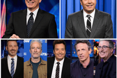 **“TV WORLD IN CHAOS: JIMMY FALLON, KIMMEL, OLIVER, AND MEYERS JOIN FORCES TO DEFEND STEPHEN COLBERT—IS MONDAY NIGHT THE BIGGEST LATE-NIGHT PROTEST EVER?”**  In an unexpected, all-out protest that’s shaking the late-night world to its core, four of the biggest names in comedy—Jimmy Fallon, Jimmy Kimmel, John Oliver, and Seth Meyers—are crossing network lines to rally behind Stephen Colbert after CBS abruptly canceled *The Late Show* just days after Colbert mocked a \$16 million deal. What’s coming next could be the most explosive moment in late-night history.  **They were never supposed to stand together.** Rivalries ran deep. But now, the talk show giants are united, and their response to Colbert’s firing isn’t a quiet whisper—it’s a full-blown rebellion against the very system that put them in the spotlight. Fallon crossed the street. Kimmel broke his silence. Meyers crafted razor-sharp monologues. And Oliver? He called it for what it truly is: *“This is a loss for everyone.”*  **No more rivalries. No more facades. No more pretending this is just another TV show.** What happens when these four men grab microphones and demand answers? The world is watching, but the laughter is long gone.  **What’s really going on behind the scenes at the Ed Sullivan Theater?** The entire comedy world is stepping up—and it’s not for a joke anymore.  **Get the full, jaw-dropping story and what’s next in this battle for late-night supremacy.** 👇👇