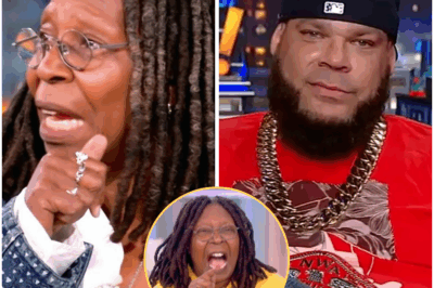**”YOU’RE A LITERAL THREAT TO OUR DEMOCRACY!” — WHOOPI GOLDBERG ERUPTS AT TYRUS LIVE ON AIR IN EXPLOSIVE SHOWDOWN THAT SHOCKS EVERYONE.**  In a moment of pure television chaos, Whoopi Goldberg unleashed a fiery, unrelenting accusation at Tyrus live on air, slamming him as a “literal threat to our democracy.” The studio buzzed with tension, as Whoopi refused to back down, her words slicing through the room like a knife. Tyrus, clearly caught off guard, tried to shrug it off with a smirk, but Whoopi wasn’t done. She locked eyes with him, delivering a devastating, razor-sharp rebuttal that left him speechless.  His confident grin quickly vanished, replaced by a stunned, almost defeated expression, as if the weight of her words had just crushed him. The room went silent. The audience, stunned and breathless, could only watch as the showdown escalated. Tyrus struggled to regain his composure, but the damage was already done.  **The explosive moment spread like wildfire on social media, and one thing was undeniable: that day, Tyrus was left floored—on live television—by a woman who refused to be silenced.**
