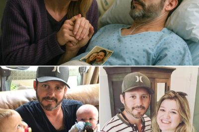 “She was the last face he saw…” — In his final days, Brandon Blackstock wasn’t surrounded by contracts, cameras, or courtrooms… but by fierce, unyielding devotion. Kelly Clarkson reportedly refused to leave his side for a single minute — turning down visitors, shutting out the world, and whispering “Don’t go yet…” into the darkness