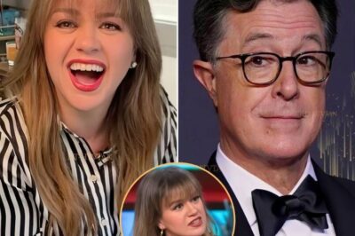 “‘DON’T FORGET YOUR SHOW JUST GOT CANCELED!’ — KELLY CLARKSON FIRES BACK AT STEPHEN COLBERT AFTER HIS VACATION JAB” 🎤🔥 What started as a cheeky dig turned into a full-blown TV feud. Stephen Colbert mocked Kelly Clarkson’s absence from her talk show, joking that her “vacation was longer than her summer vacation.” But Clarkson didn’t hold back, snapping back on The Kelly Clarkson Show: “Stephen, don’t forget that your Late Show just got canceled!” Now the internet is ablaze with #ClarksonVsColbert — sparking rumors, speculation, and even whispers about whether Clarkson might walk away from her own hit show. Was this just playful banter between two talk show stars… or the beginning of late-night’s messiest new rivalry? READ THE FULL STORY BELOW 👇👇👇