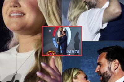 CH2 . 💥 “No One Can Replace Charlie,” Erika Said. “But I See Some Similarities in JD.” — What Happened Next Left the Room Breathless  “No one can replace Charlie,” Erika’s voice vibrated through the microphone, controlled but cracking just enough to make 5,000 people hold their breath. “But… I see some similarities in JD.”  The spotlights cut white across the Ole Miss stage like searchlights. Erika Kirk stood alone — a 32-year-old widow, her mascara smudged but chin lifted. Then she turned. And JD Vance emerged.  It wasn’t just a tribute. It was a handoff.  The first hug was long, and quiet. Her right hand around his back. Her left… unseen, except by the zoom lens. A slow stroke behind his ear. His eyes closed — 0.3 seconds. Not enough to prove anything. More than enough to raise questions.  Details: No script. No political message. Just one sentence, one look, and a silence that said more than any endorsement ever could.  Was it grief? Legacy? Or something beginning in plain sight? 👇 Watch the moment the cameras didn’t expect to capture 👇