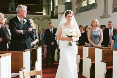 My Parents Laughed When I Walked Alone To My Wedding, But Their Faces Changed When The Doors Opened…     My mom looked at me in my wedding dress and laughed. So, you’re really doing this? Walking down alone like you have no family?